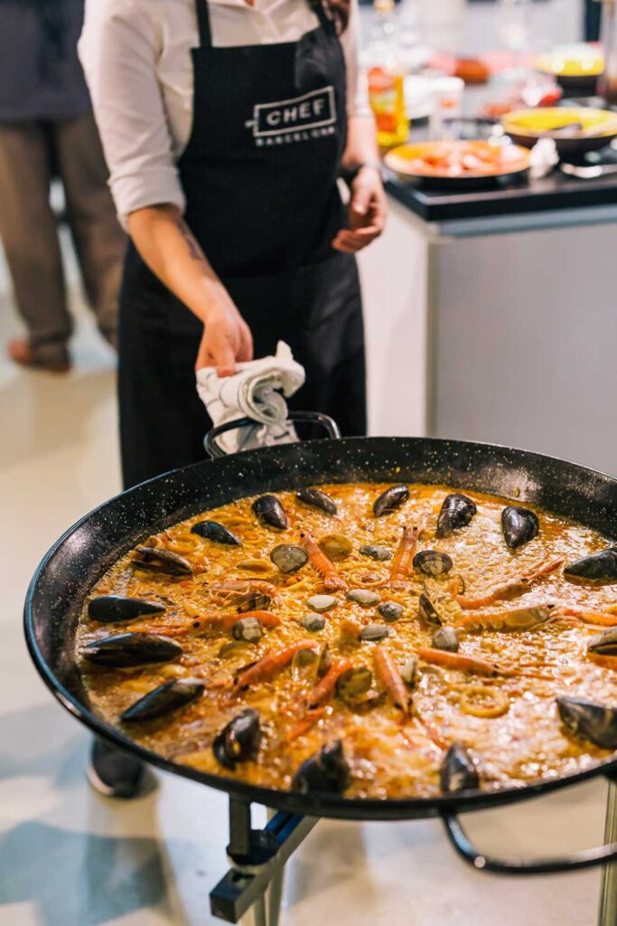 making the perferct seafood paella in one of our activities for teams in Barcelona Spain